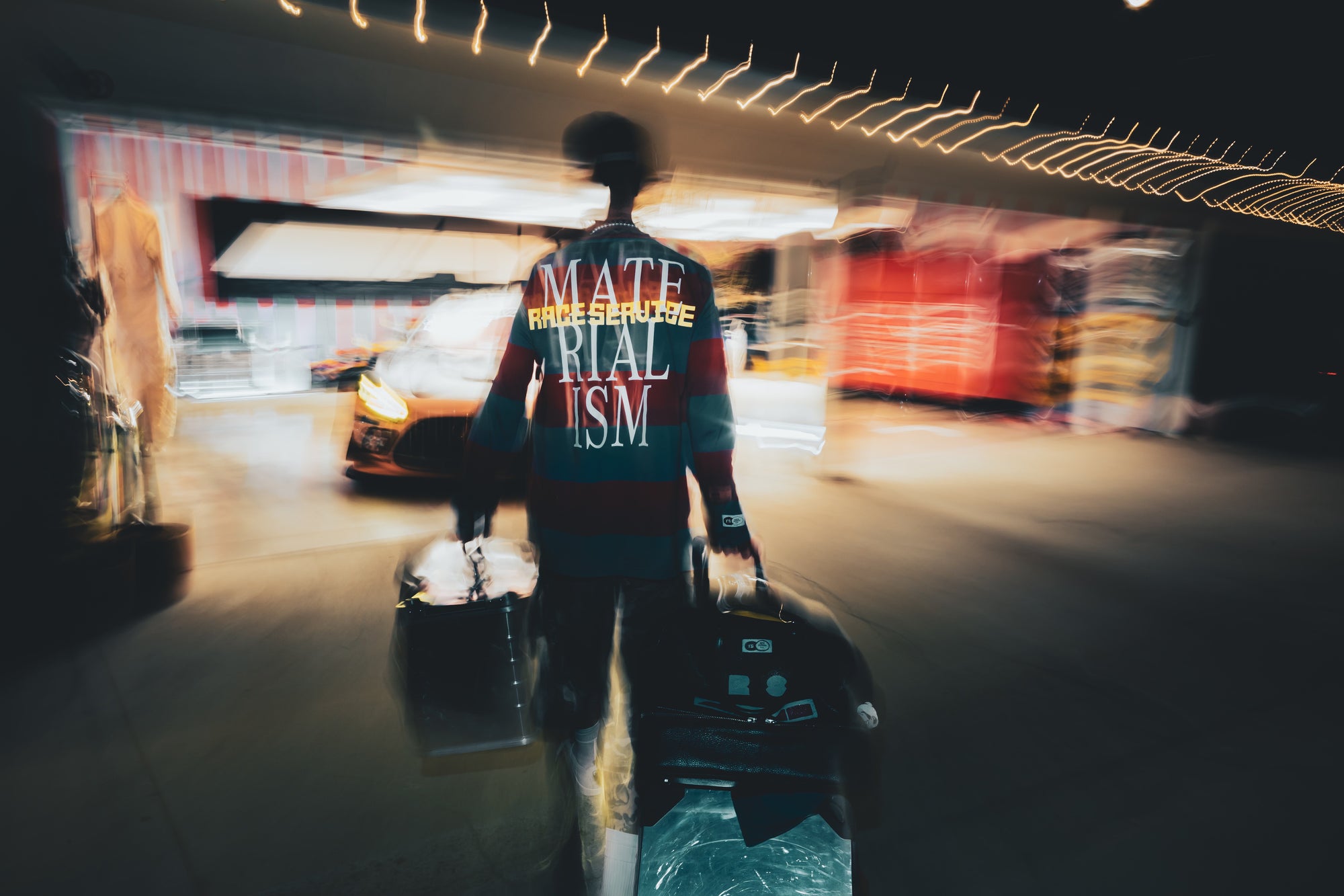 'MATERIALISM' STRIPED LONG-SLEEVE