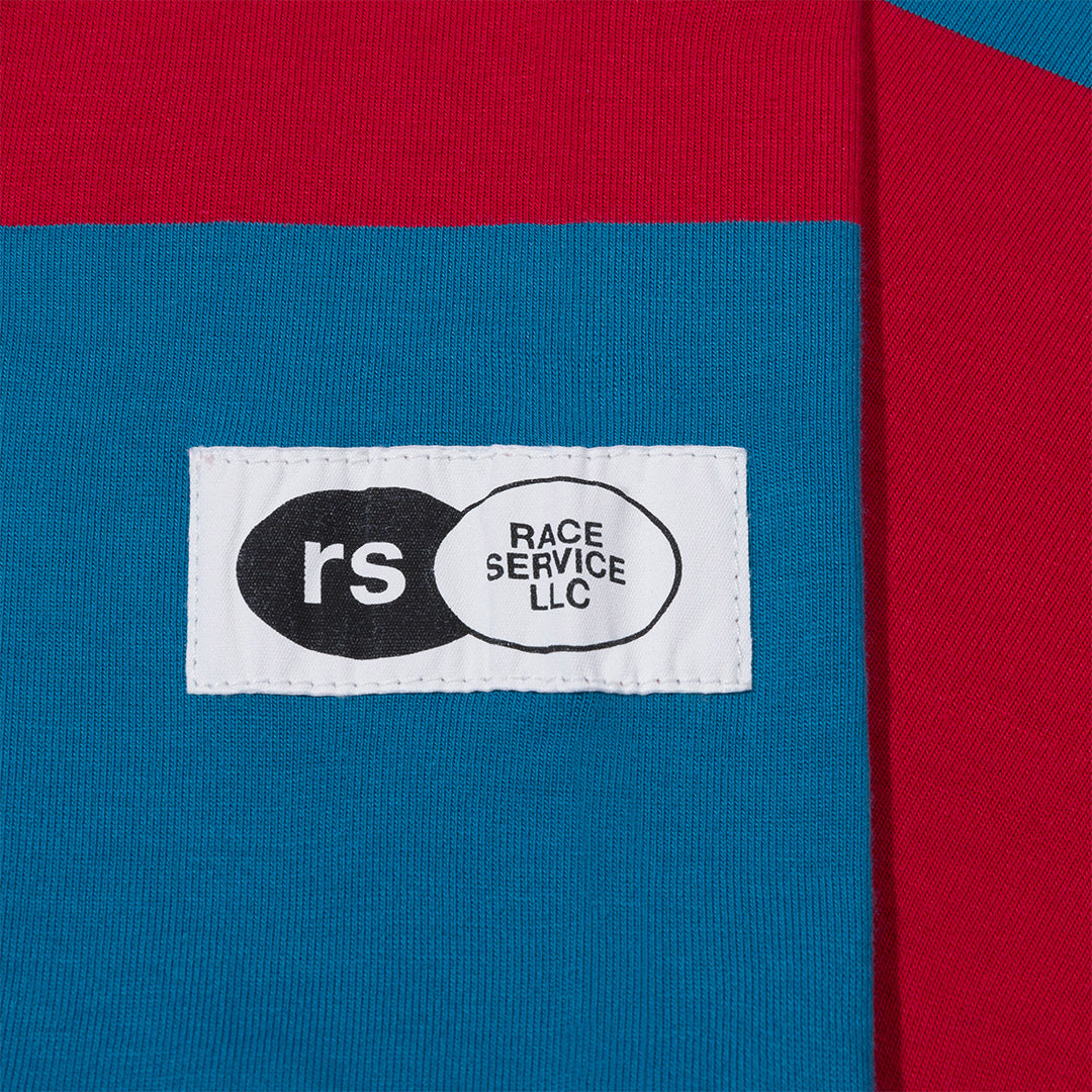 'MATERIALISM' STRIPED LONG-SLEEVE